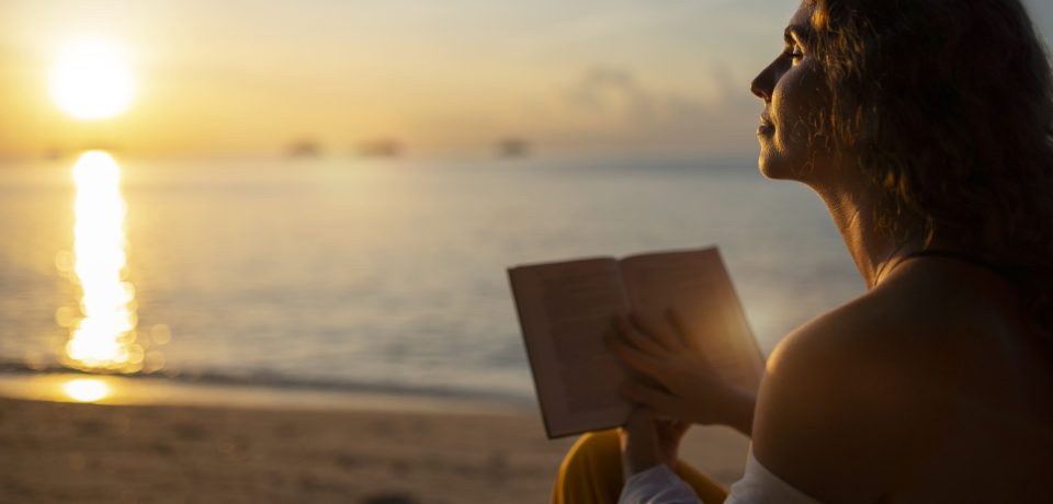 woman-reading-beach-side-view (1) (1)